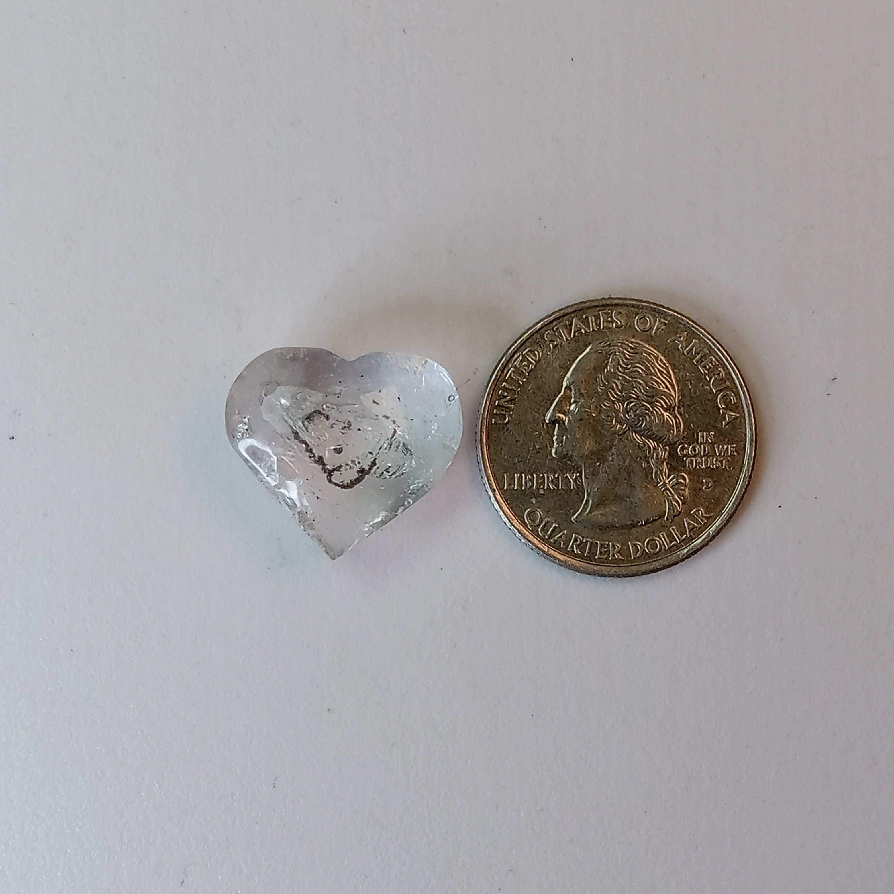Moving Carbon Speck Enhydro Quartz Heart – Clear Quartz Heart Carving