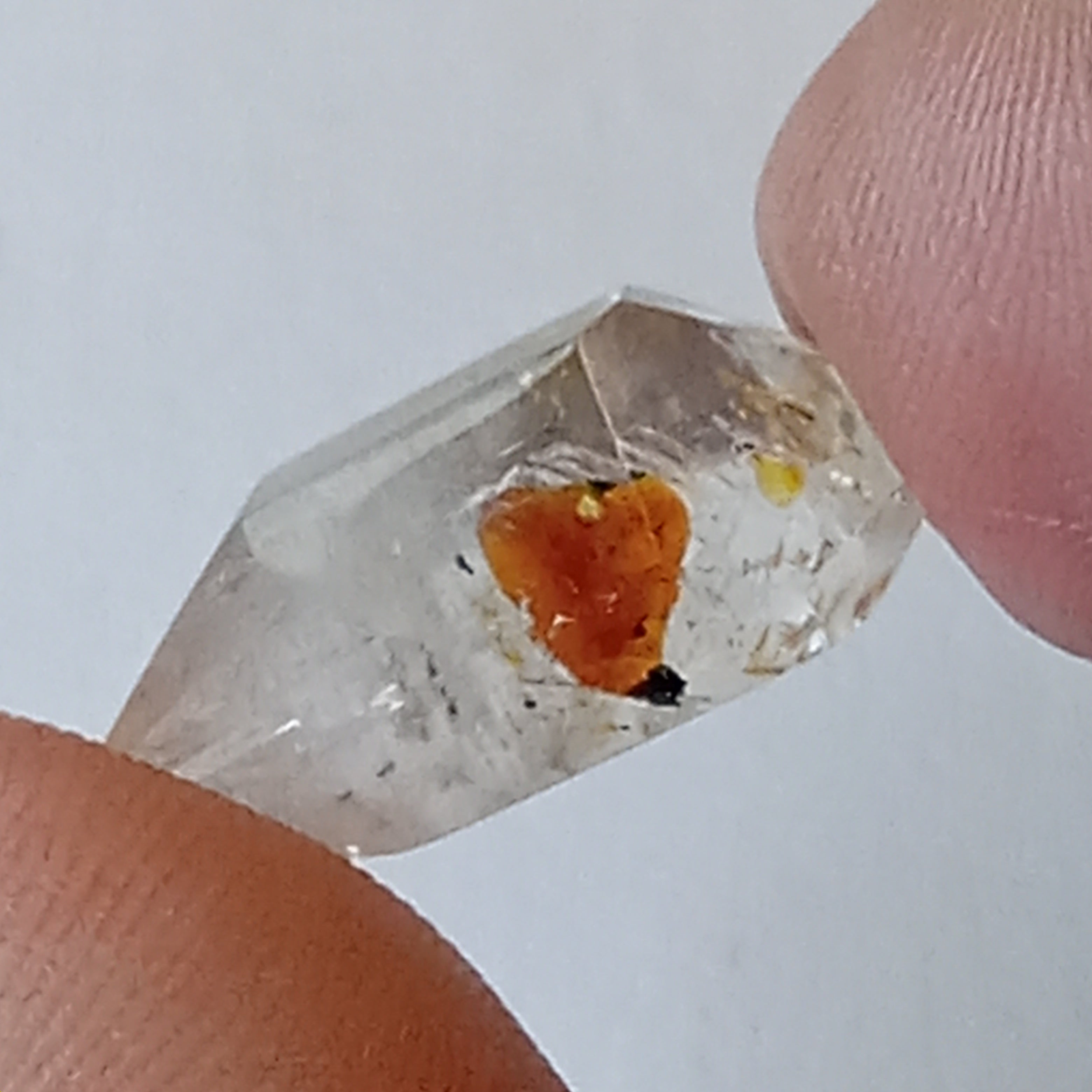 Double Terminated Oil Bubble Enhydro Quartz with UV Reactive Inclusion