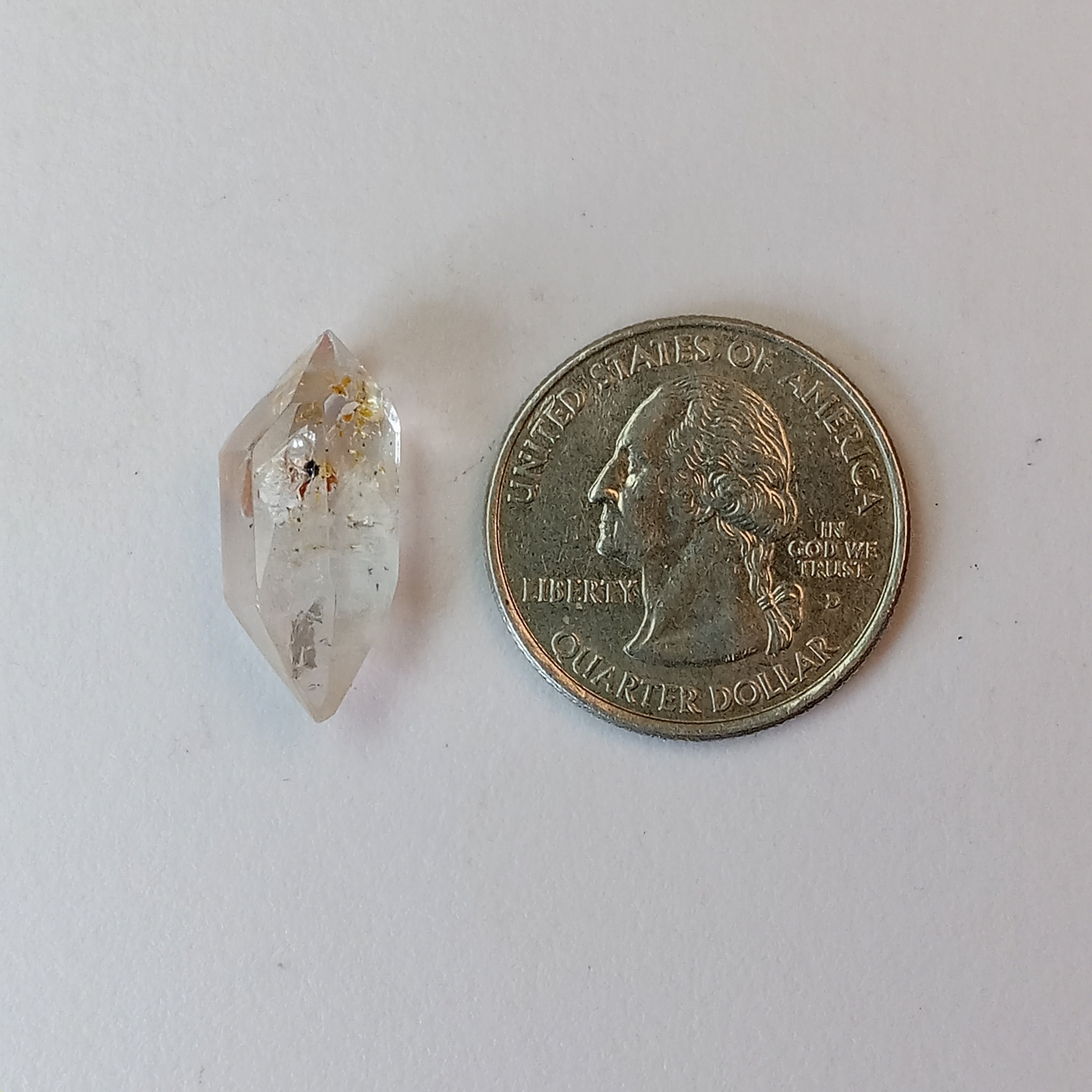 Double Terminated Oil Bubble Enhydro Quartz with UV Reactive Inclusion