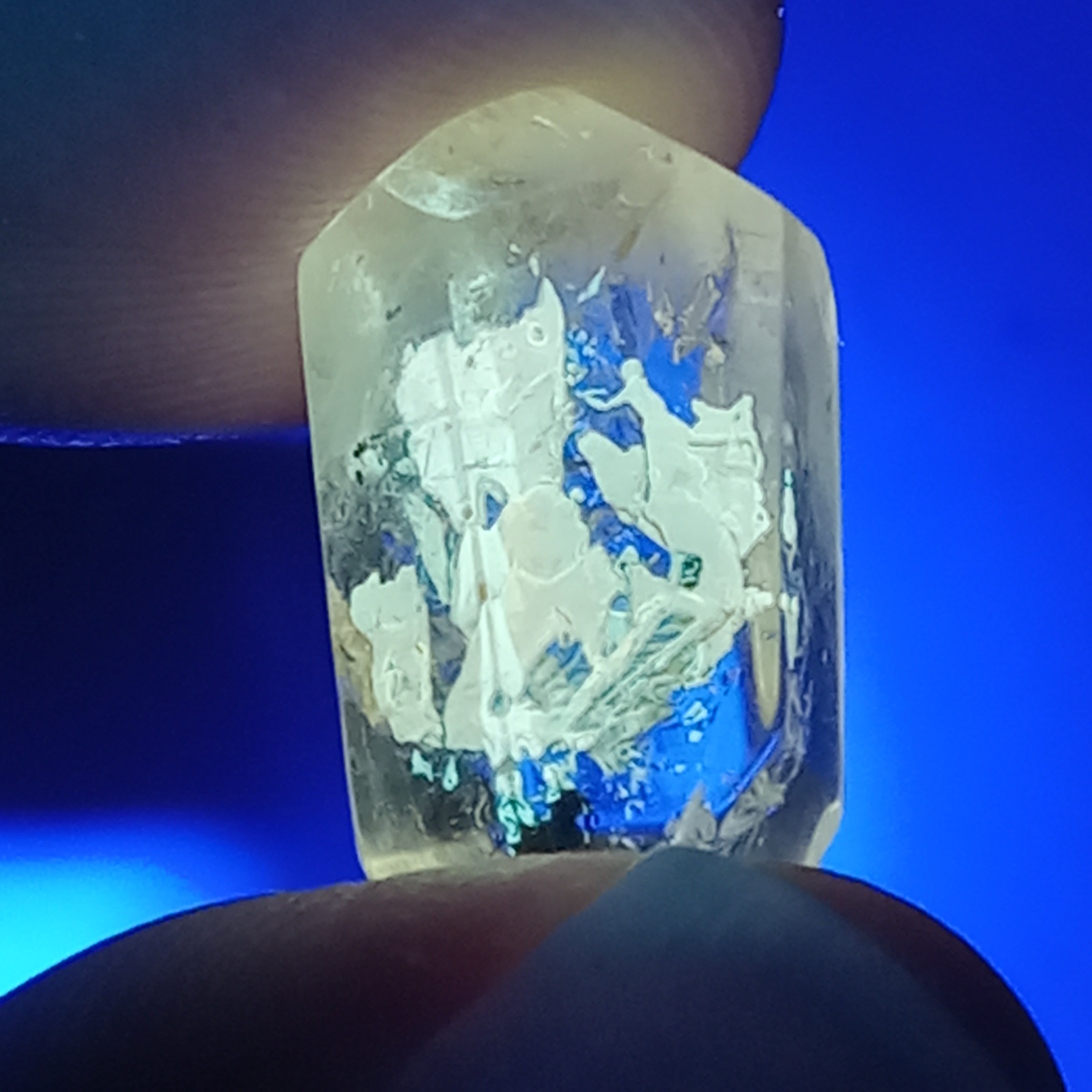Double Terminated Petroleum Enhydro Quartz with Two Moving Oil Bubbles & UV Glow