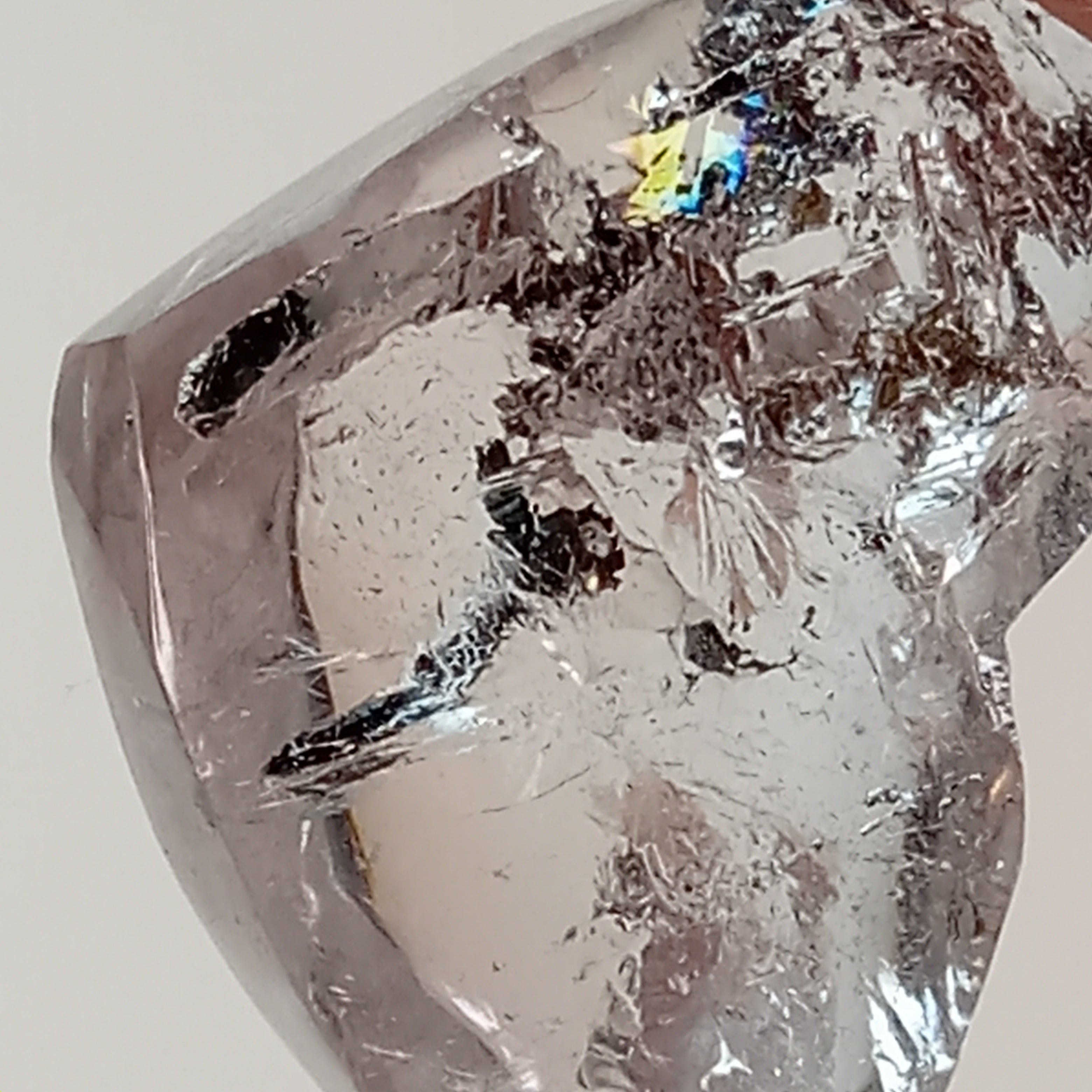 Clear Enhydro Quartz Heart with Moving Carbon Bubble and Floating Sand