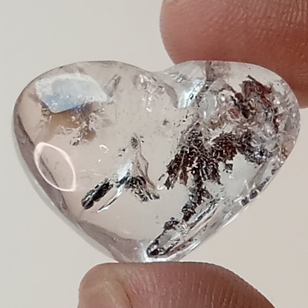 Clear Enhydro Quartz Heart with Moving Carbon Bubble and Floating Sand