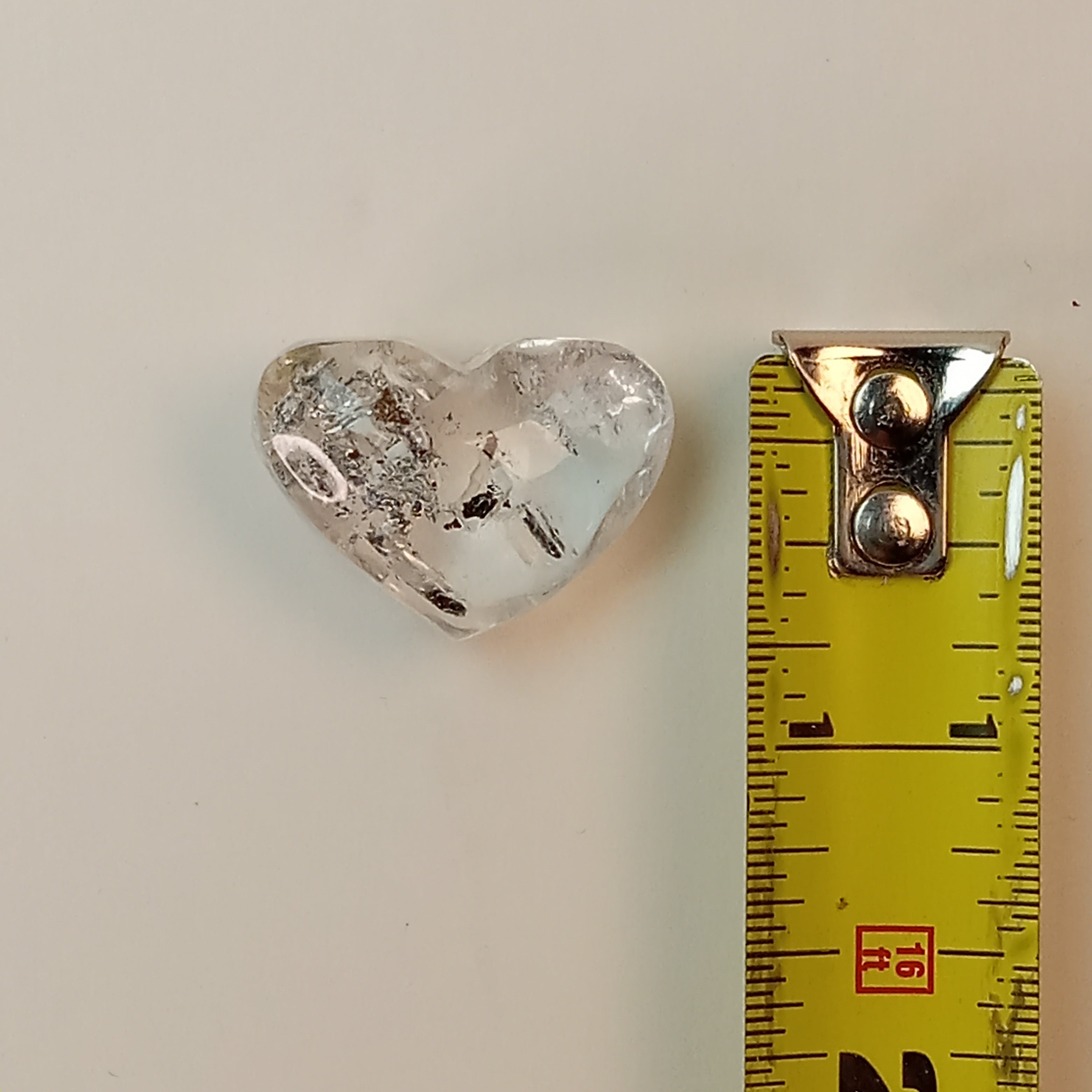Clear Enhydro Quartz Heart with Moving Carbon Bubble and Floating Sand