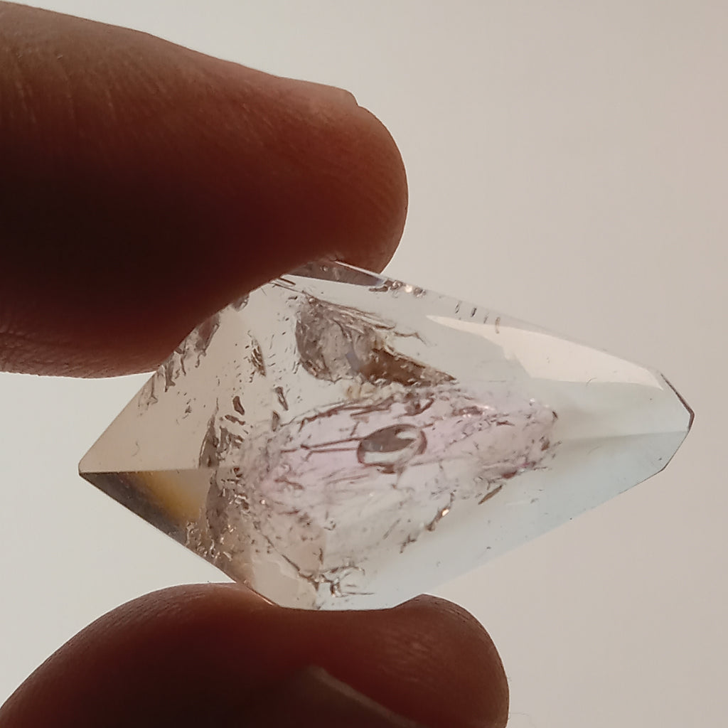 Double-Terminated Enhydro Quartz Bubble with UV Reactive Liquid
