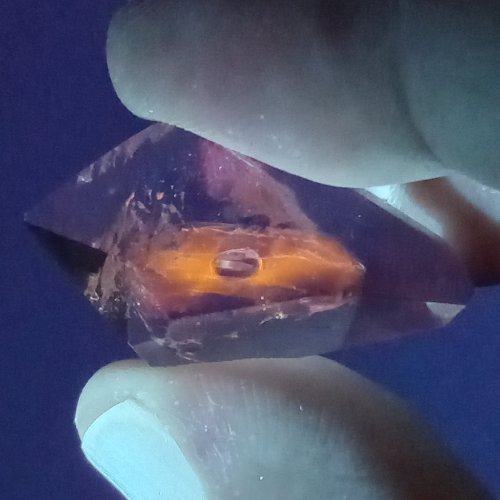 Double-Terminated Enhydro Quartz Bubble with UV Reactive Liquid