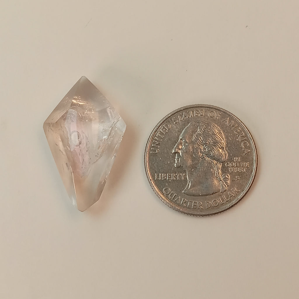 Double-Terminated Enhydro Quartz Bubble with UV Reactive Liquid