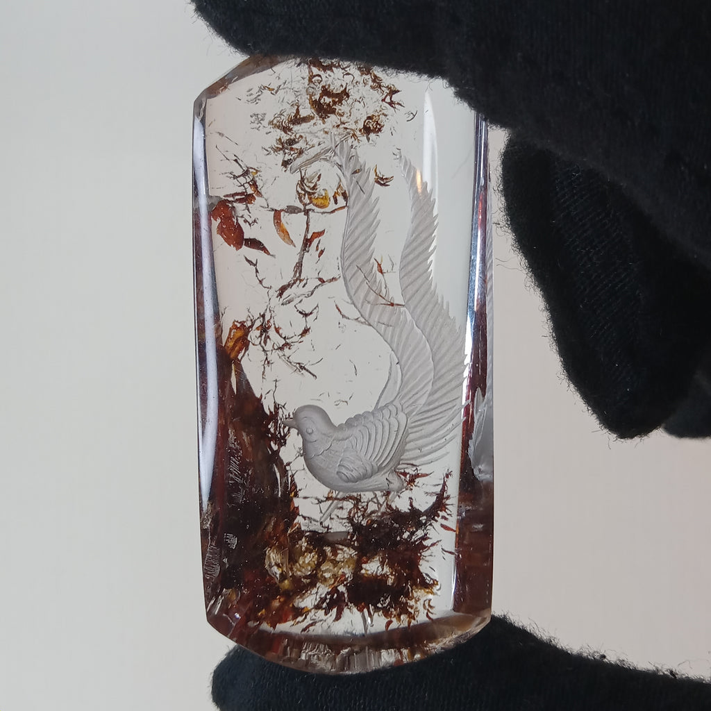 Bird Carving Suspended Inside Hematoid Quartz