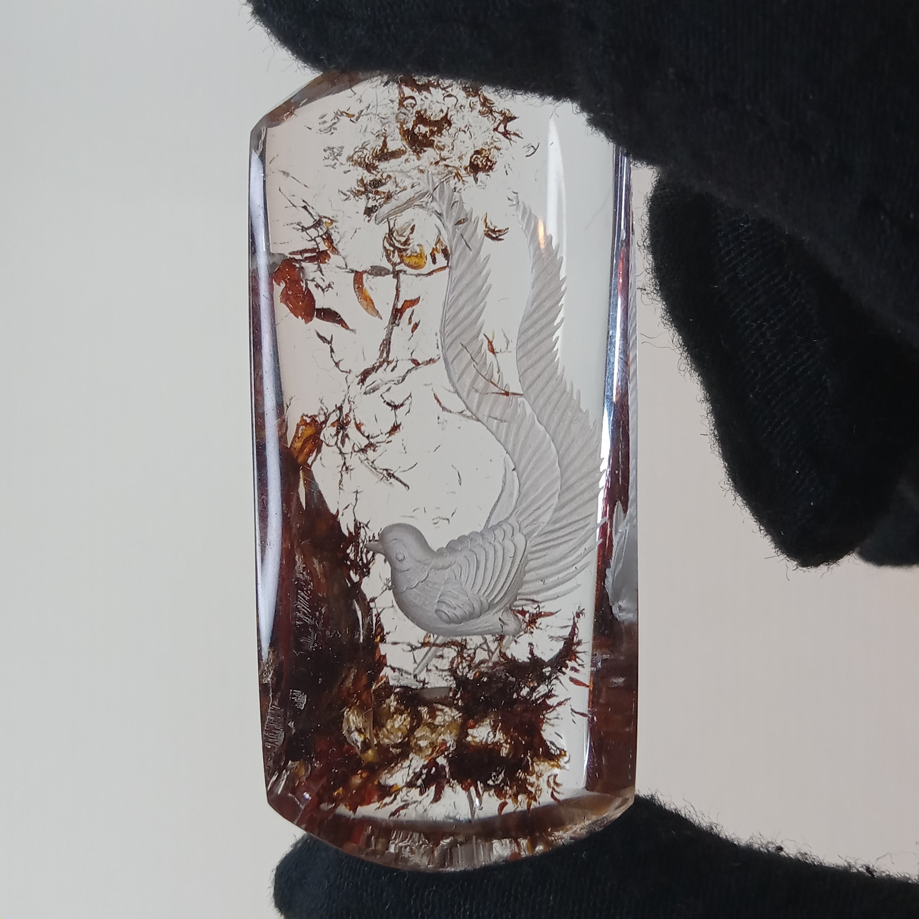 Bird Carving Suspended Inside Hematoid Quartz
