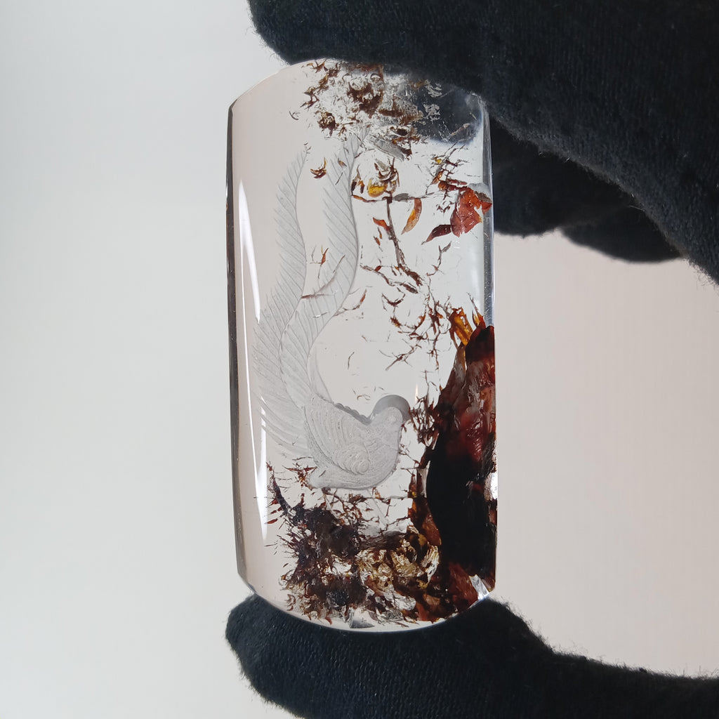 Bird Carving Suspended Inside Hematoid Quartz