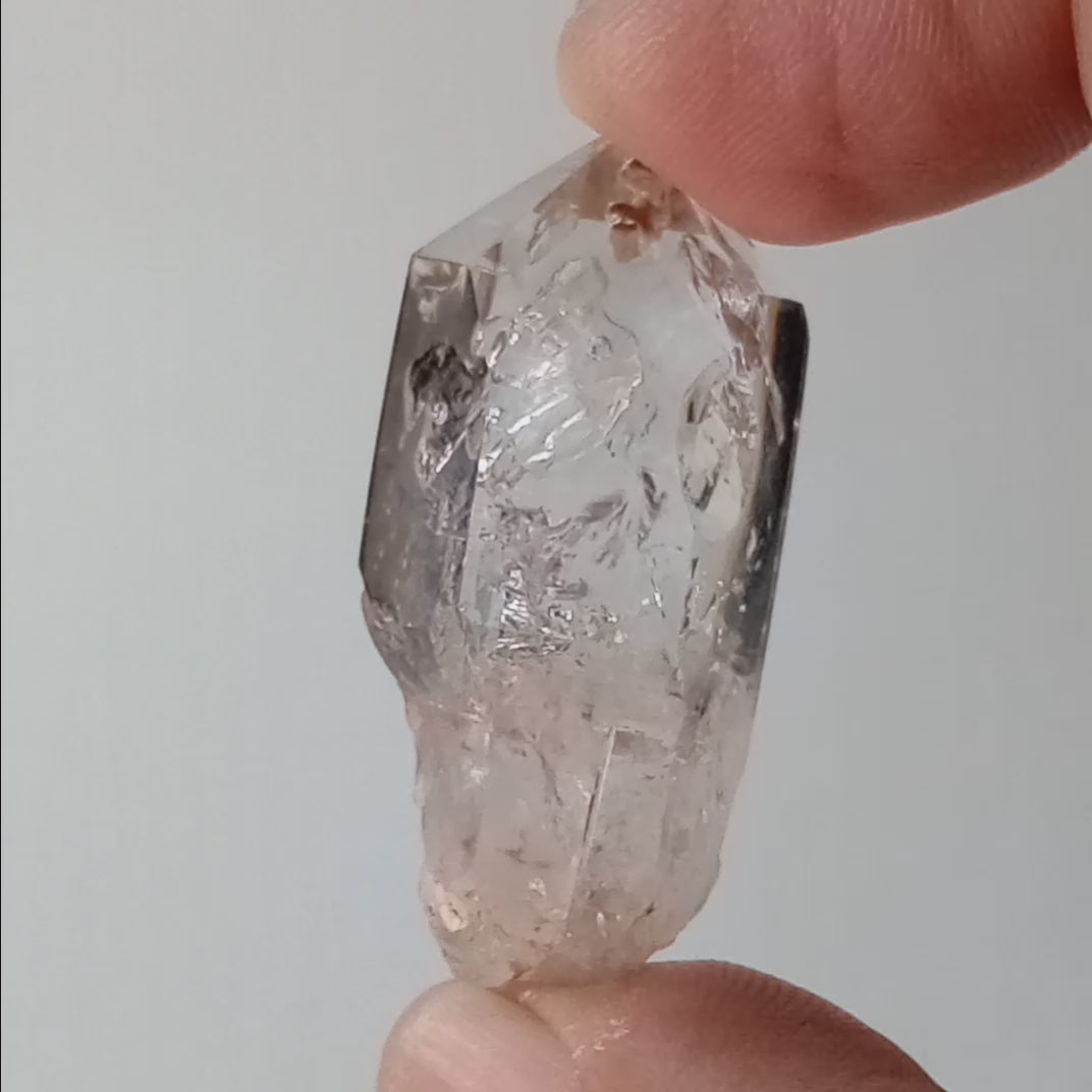 Petroleum Enhydro Quartz with Two UV-Reactive Moving Bubbles