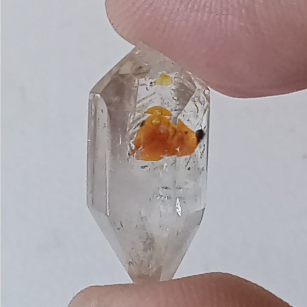 Double Terminated Oil Bubble Enhydro Quartz with UV Reactive Inclusion