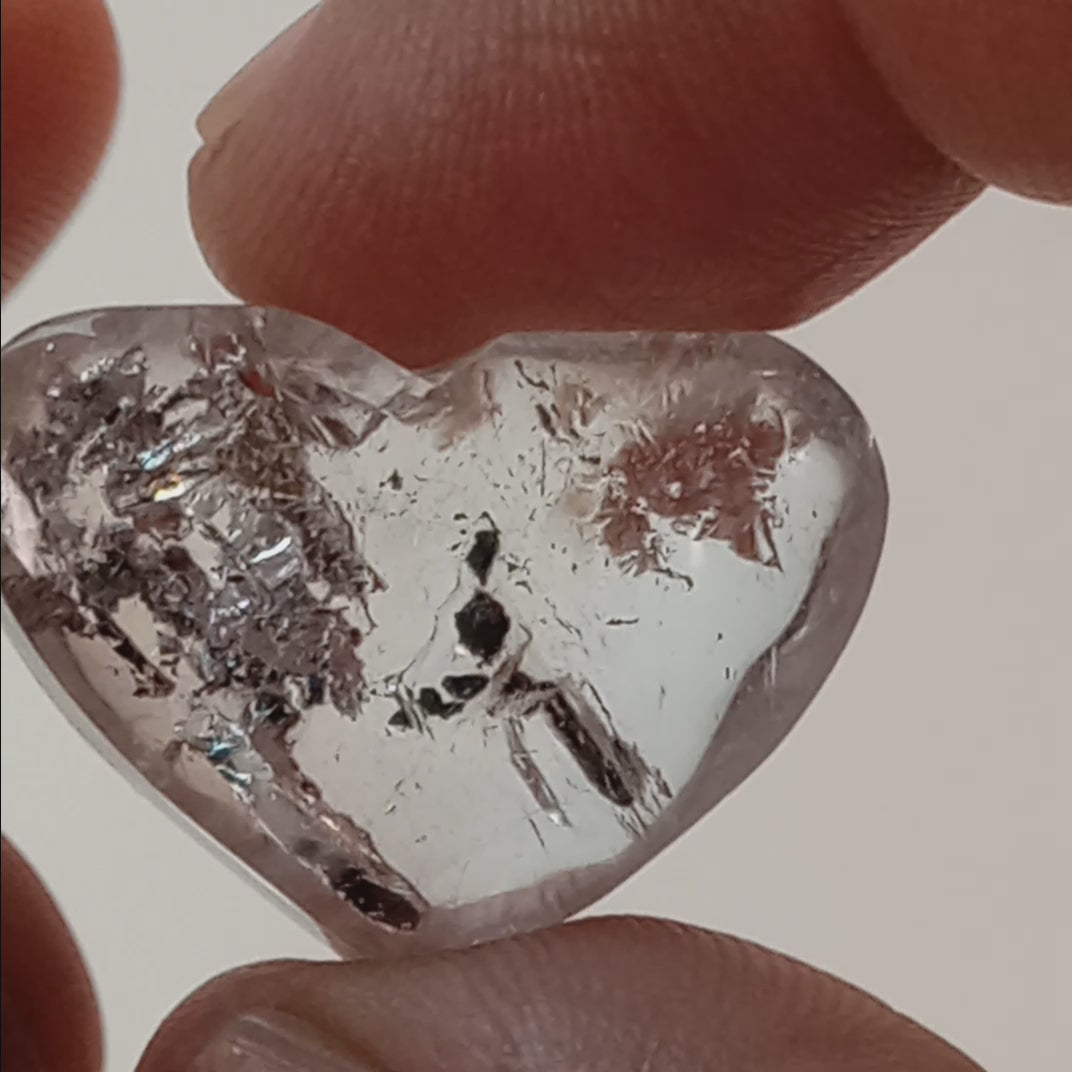 Clear Enhydro Quartz Heart with Moving Carbon Bubble and Floating Sand