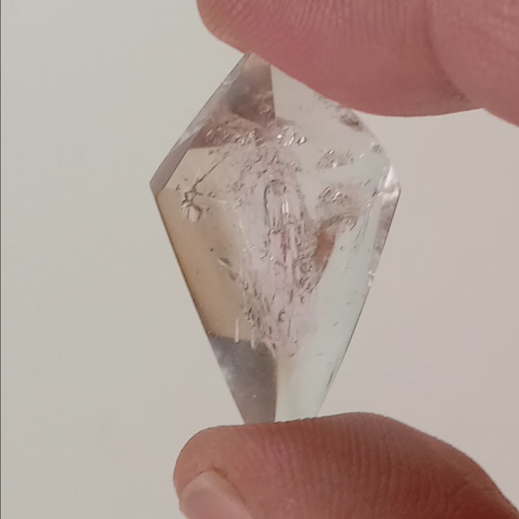 Double-Terminated Enhydro Quartz Bubble with UV Reactive Liquid